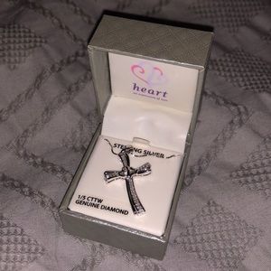 Silver cross necklace with hearts